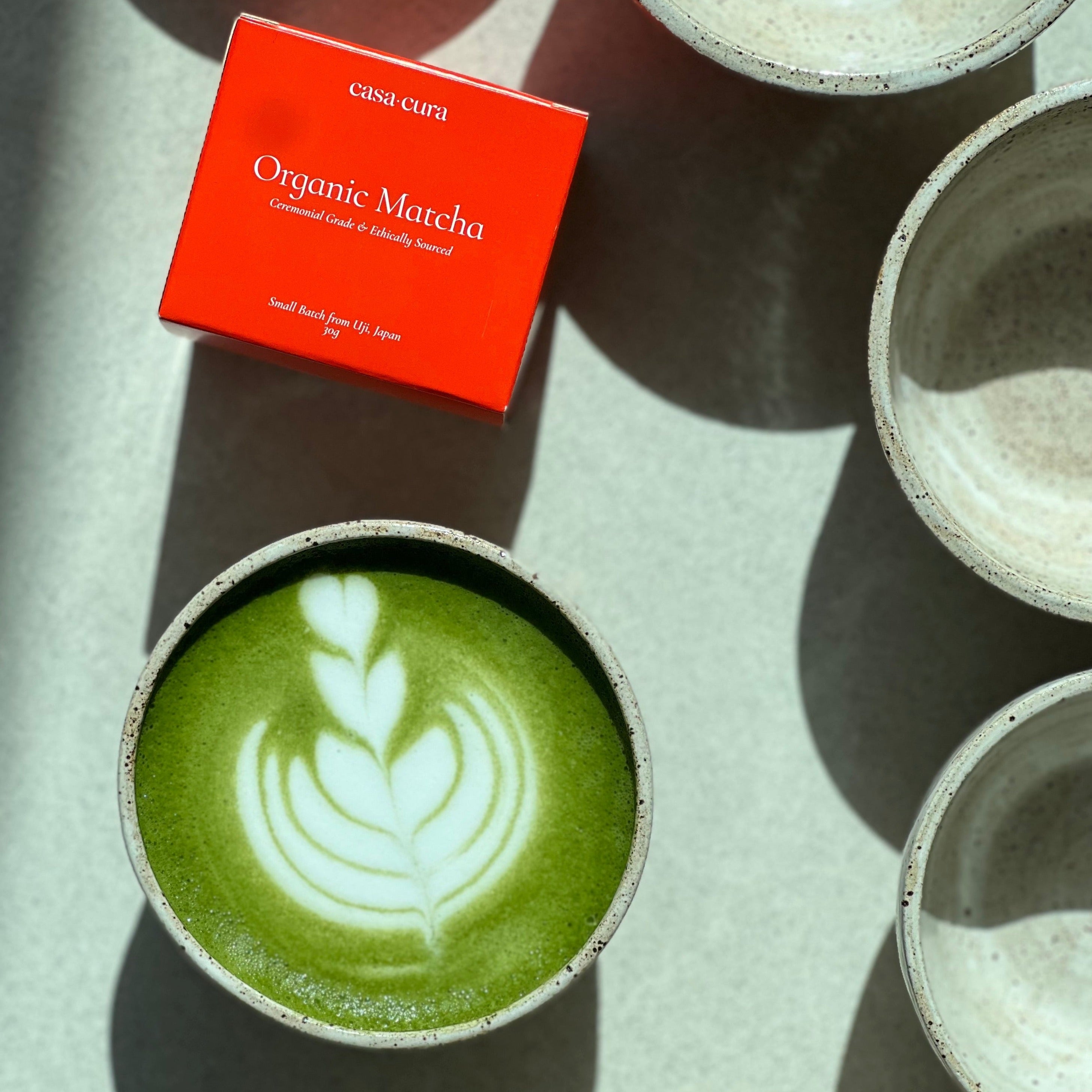 Handmade matcha bowl and Casa Cura Organic Matcha.